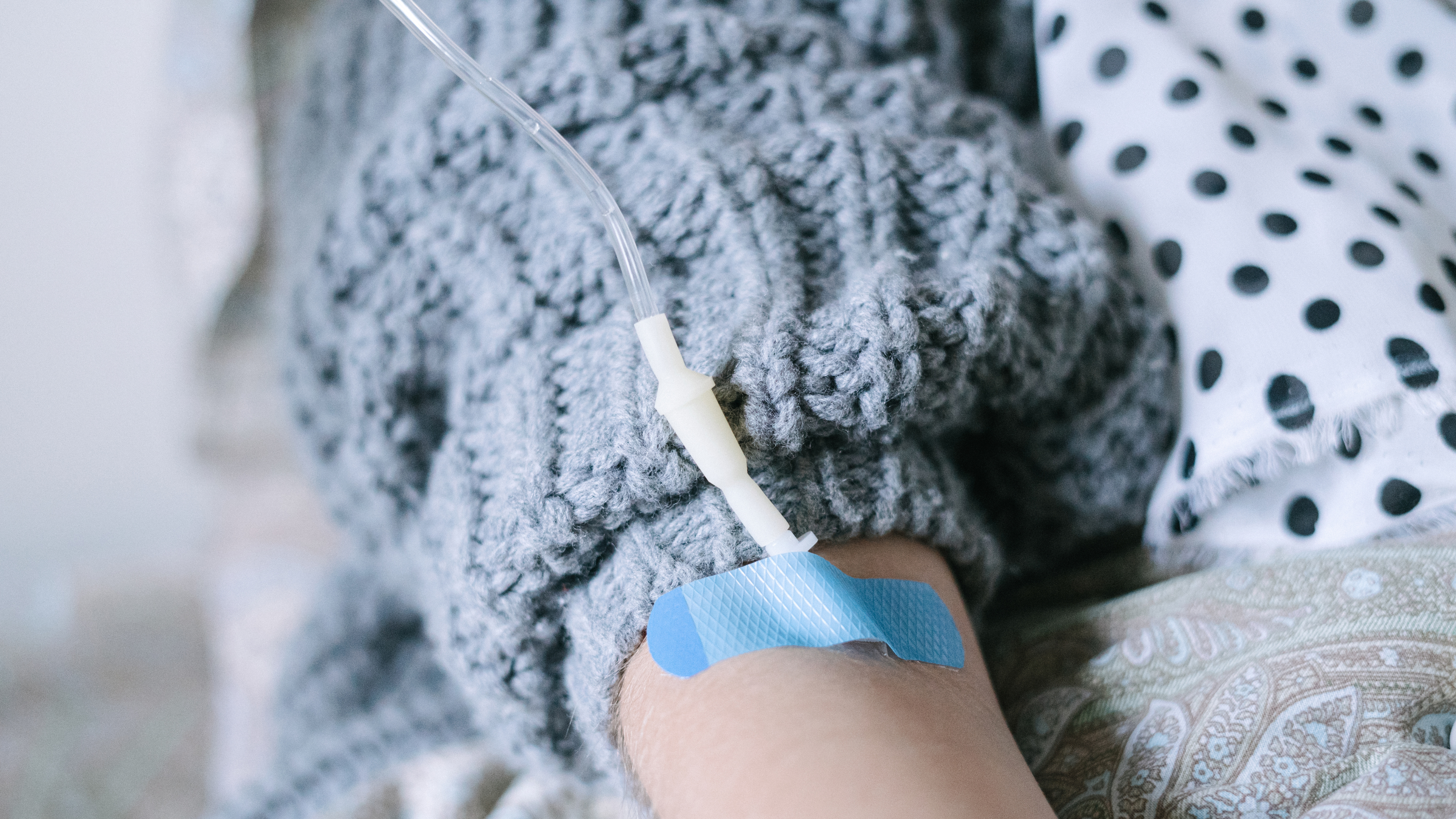 Arm of a woman with IV in relation to "Handy Things That Help Ease Neuropathy During Chemotherapy".