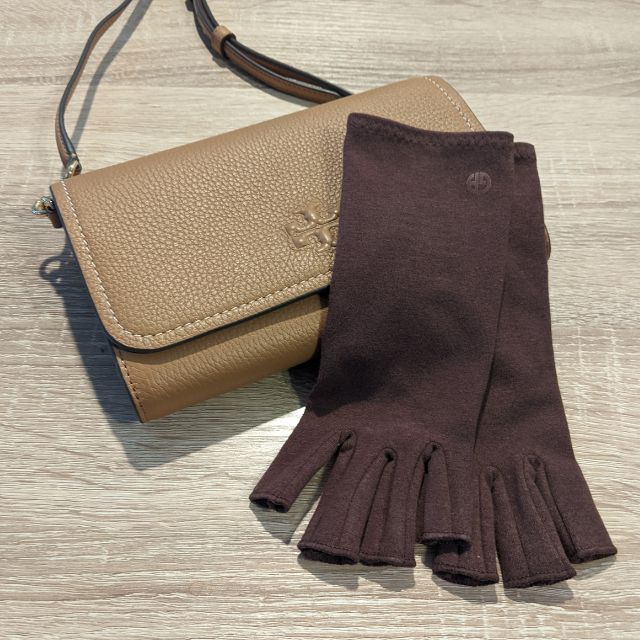 Chocolate Brown Compression Gloves For arthritis and a brown purse