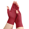 A woman with arthritis wearing Chili Red Compression Gloves. Her hands are crossed with palms to the front.