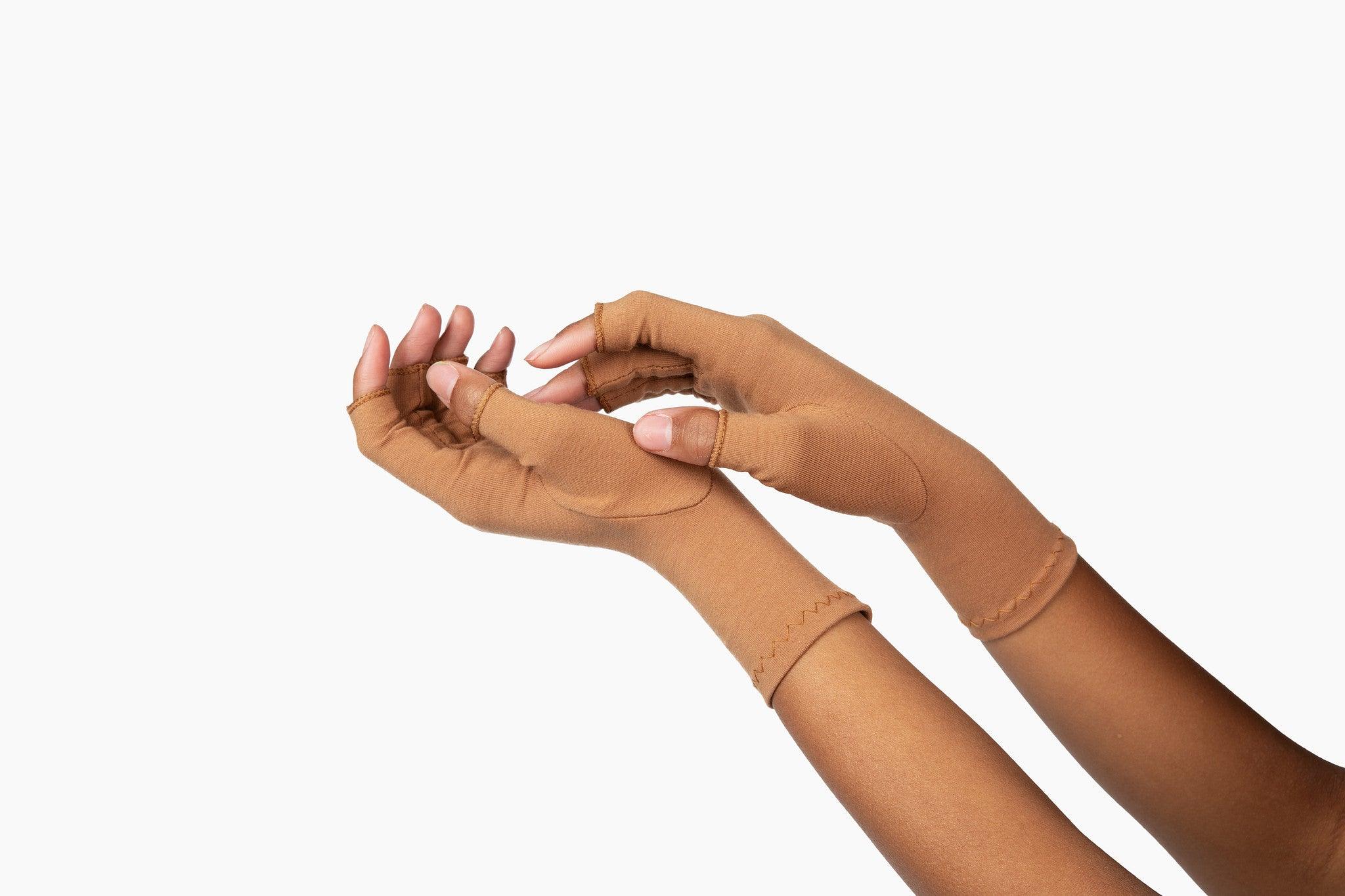 Cinnamon Brown Compression Gloves on a woman's hands