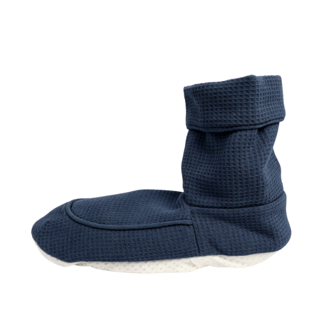 Side view of Grace & Able heated slippers in Ocean Blue