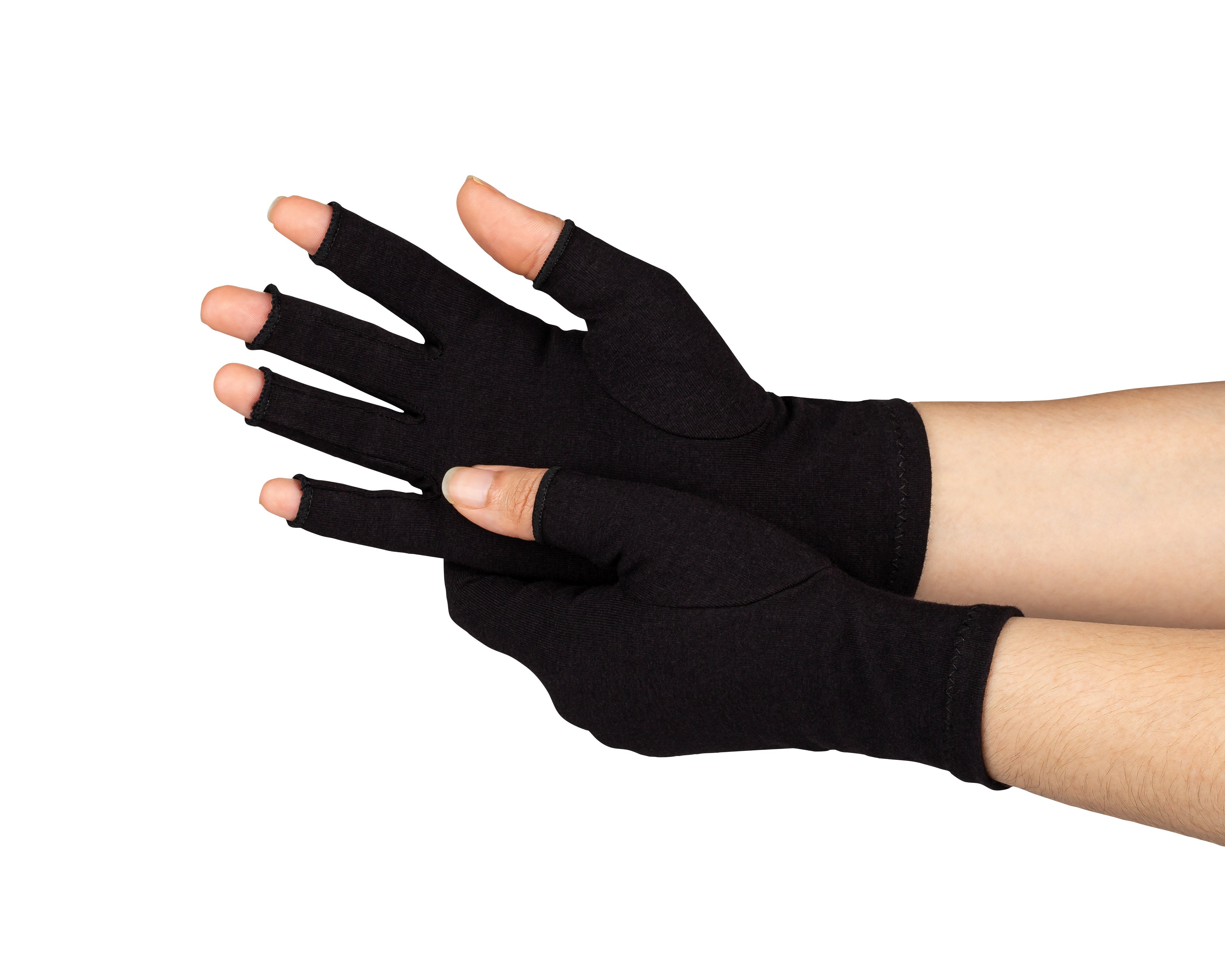 A close-up of hands of a woman with arthritis, wearing Classic Black Compression Gloves with open fingers, her palm turned up to the camera on a white background.