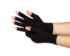 A close-up of hands of a woman with arthritis, wearing Classic Black Compression Gloves with open fingers, her palm turned up to the camera on a white background.