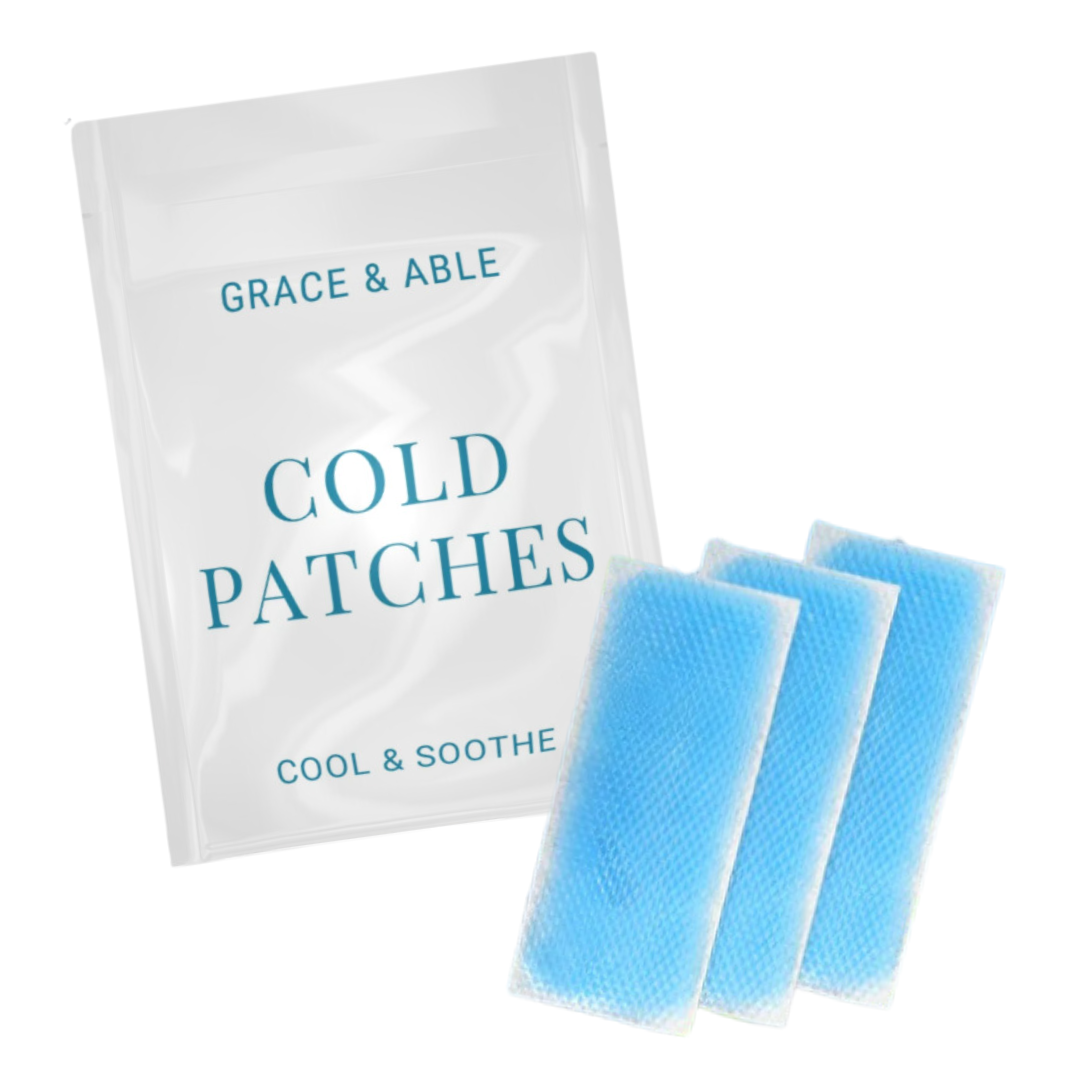 A white package with teal lettering that reads 'Grace & Able Cold Patches' and three blue gel patches for women with arthritis placed on a white background
