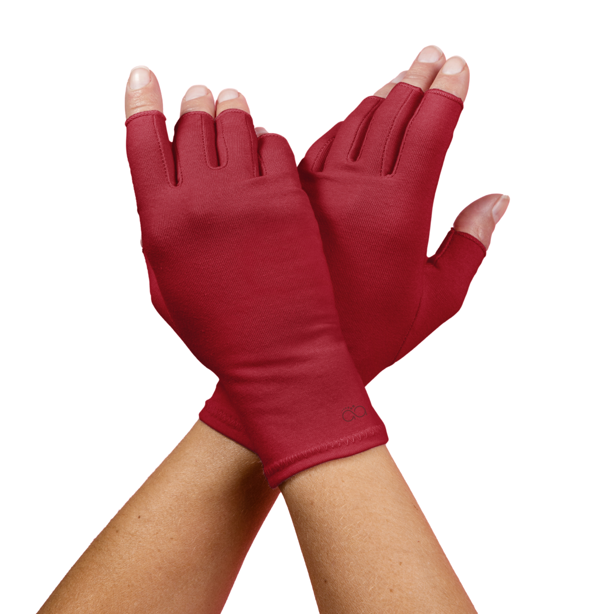 Crossed hands of a woman with arthritis wearing Chili Red Compression Gloves on white background