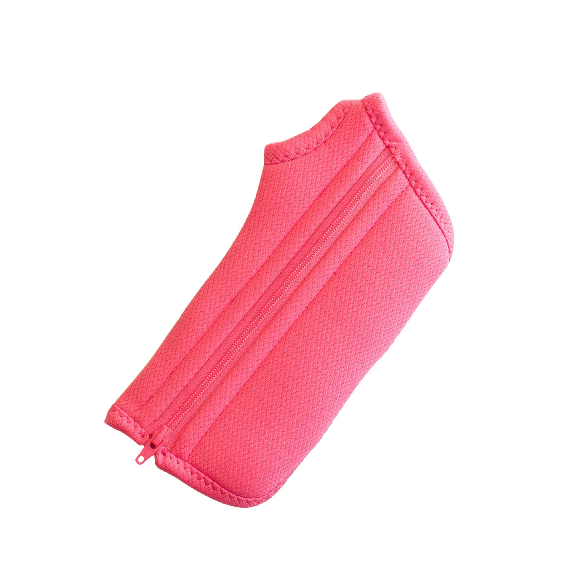 A close-up of a Bubblegum Pink Wrist Brace with a zipper perfect for women with arthritis and carpal tunnel syndrome.