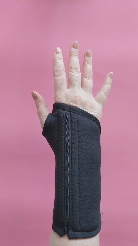 A woman with arthritis tried on Pink Brace Cover, Blue Brace Cover and Black Brace Cover over her Black Wrist Brace for arthritis and carpal tunnel syndrome