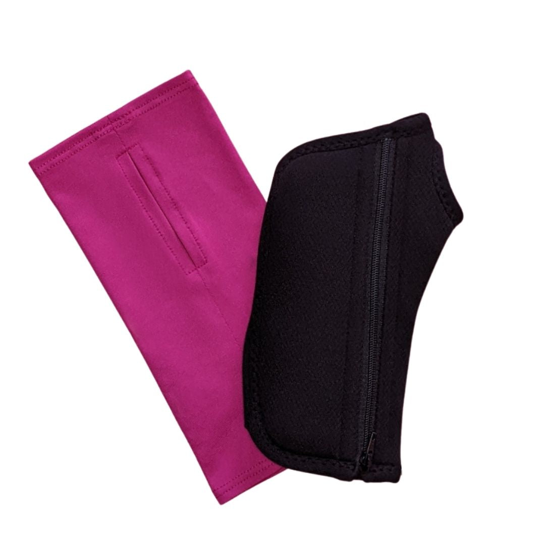 A Fushia Pink Wrist Brace Cover made of recycled polyester sitting near a Black Wrist Brace for arthritis and carpal tunnel syndrome.
